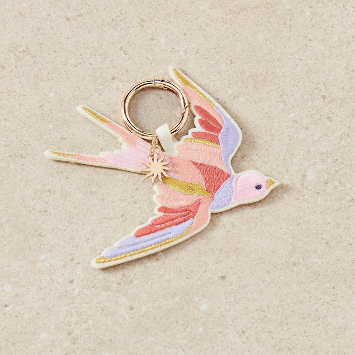 Happinez 6-2025 + bag charm Zwaluw